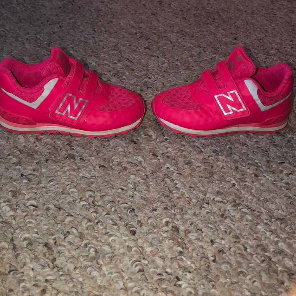 Hot Pink New Balance Sneakers.